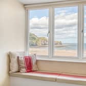 This wndow seat isn't the only place in the apartment that has wonderful sea views