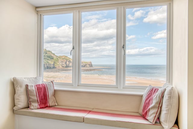 This wndow seat isn't the only place in the apartment that has wonderful sea views
