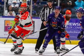 STRONG ARM: Sheffield Steelers' Mark Simpson battles for puck possession against Glasgow Clan at Braehead Arena Picture:  Al Goold/EIHL Media