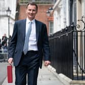 Chancellor of the Exchequer Jeremy Hunt leaves 11 Downing Street, London, with his ministerial box before delivering his Budget in the Houses of Parliament. PIC: Stefan Rousseau/PA Wire