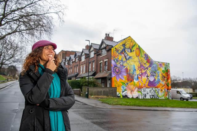 Rhian Kempadoo- Millar photographed by Tony Johnson for The Yorkshire Post Magazine, who designed the mural celebrating the Leeds West Indian Carnival
and was joined by 3 other artists to paint the gable wall of a property opposite the Leeds West Indian Centre in Chapeltown