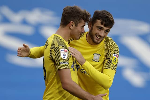 Preston North End's Troy Parrott (right) celebrates his goal with Ryan Ledson in the win over Huddersfield Town (Picture: Richard Sellers/PA)