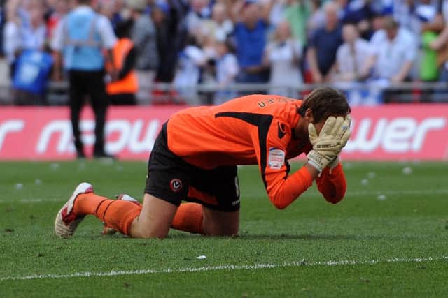 AGONY: Sheffield United goalkeeper Steve Simonsen slumps to the ground after missing the all-important spot-kick during the League One play-off final against Huddersfield Town in May 2012. Picture: Jonathan Gawthorpe.