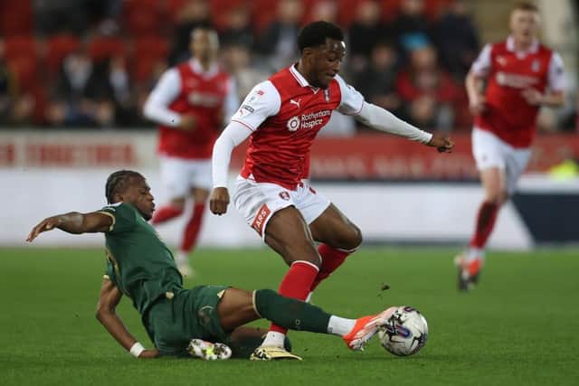 ROTHERHAM, ENGLAND - APRIL 5: Sebastian Revan of Rotherham United and Bali Mumba of Plymouth Argyle in action during the Sky Bet Championship match between Rotherham United and Plymouth Argyle at AESSEAL New York Stadium on April 5, 2024 in Rotherham, England.(Photo by Ed Sykes/Getty Images)
