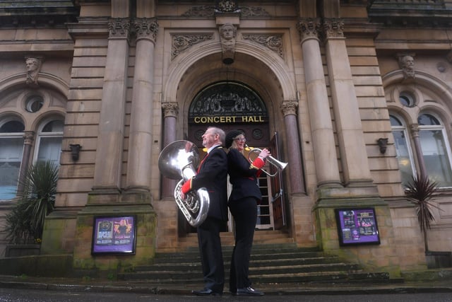 Jess Hay and Geoff Fowler from Tingley Brass Band outside Huddersfield Town Hall