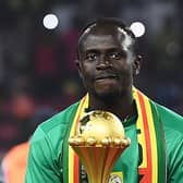 Senegal's forward Sadio Mane holds the trophy prior to the ceremony after winning after the Africa Cup of Nations (CAN) 2021 final football match between Senegal and Egypt at Stade d'Olembe in Yaounde on February 6, 2022. (Picture: CHARLY TRIBALLEAU/AFP via Getty Images)
