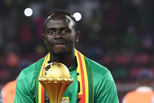 Senegal's forward Sadio Mane holds the trophy prior to the ceremony after winning after the Africa Cup of Nations (CAN) 2021 final football match between Senegal and Egypt at Stade d'Olembe in Yaounde on February 6, 2022. (Picture: CHARLY TRIBALLEAU/AFP via Getty Images)