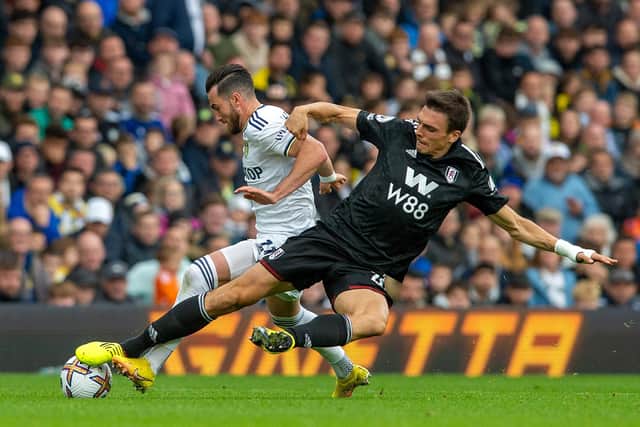 BATTLING: Fulham's Joao Palhinha tackles Jack Harrison