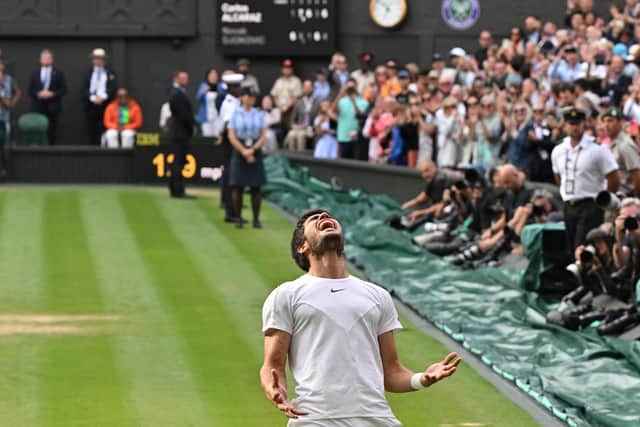Spain's Carlos Alcaraz celebrates beating Serbia's Novak Djokovic in the Wimbledon final (Picture: GLYN KIRK/AFP via Getty Images)