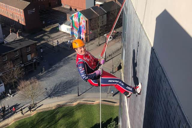 Rowan Campbell-Pilling made his way down the side of a building at Sheffield Hallam University to raise money for Sheffield Children’s Hospital.