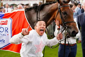 JUST ONE MORE: Frankie Dettori celebrates winning the Sky Bet Ebor Handicap on Absurde during day four of the Ebor Festival at York Racecourse. Picture: Mike Egerton/PA
