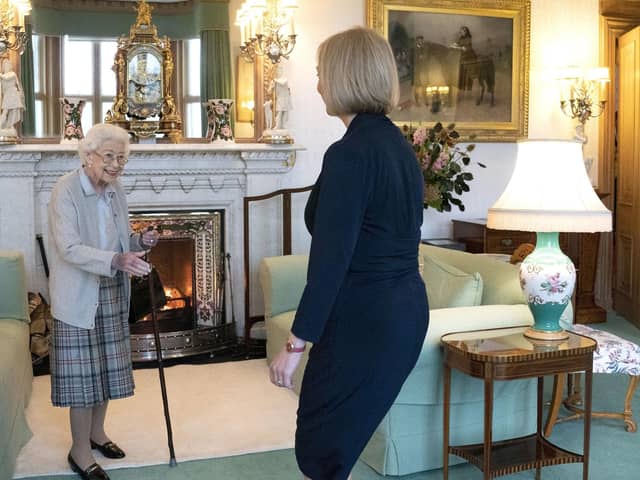 Queen Elizabeth II welcomes Liz Truss during an audience at Balmoral, Scotland, where she invited the newly elected leader of the Conservative party to become Prime Minister and form a new government. PIC: Jane Barlow/PA Wire