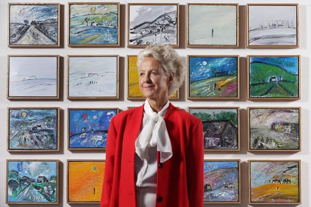 Kitty North stands in front of her exhibition at Salts Mill. (Pic credit: Lorne Campbell / Guzelian / Salts Mill)