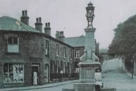 The original fountain when it was in place at Bailiff Bridge crossroads, pictured circa 1912