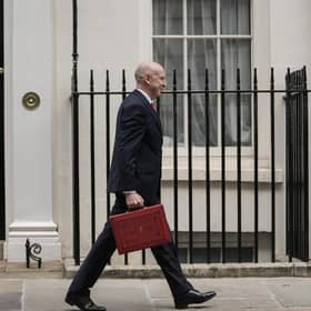 Britain's Chancellor of the Exchequer John Healey leaves 11 Downing Street with the Budget Box. (Photo by CARLOS JASSO / AFP via Getty Images)