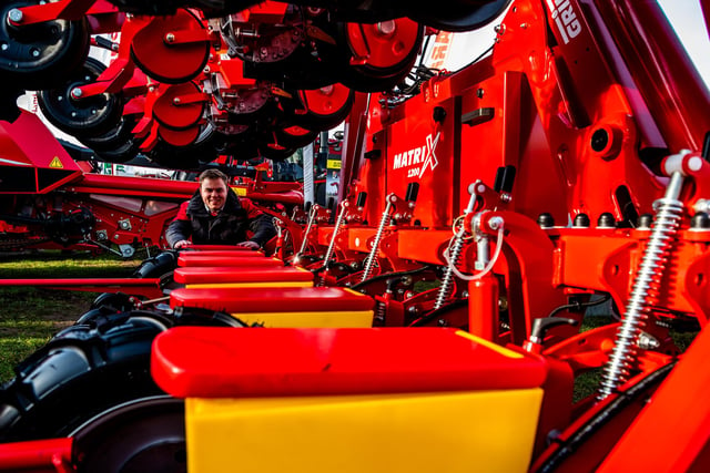 Tom Mordue, Sales Manager (Yorkshire) for Grimme an innovative manufacturer of potato, sugar beet and vegetable technology looking at a Grimme Matrix 1200 Sugar Beet Drill.