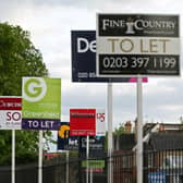 A variety of To Let, Let By and Sold estate agent signs outside houses. PIC: PA