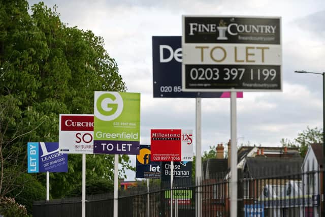 A variety of To Let, Let By and Sold estate agent signs outside houses. PIC: PA