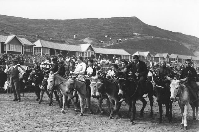 The starting line of a donkey race on the beach at Scarborough circa 1913.