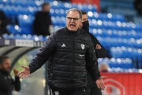 Leeds United's Argentinian head coach Marcelo Bielsa gestures from the sidelines during the English Premier League football match between Leeds United and Southampton at Elland Road in Leeds, northern England on February 23, 2021.