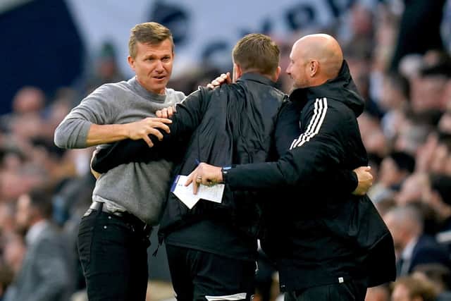 Leeds United manager Jesse Marsch (left) celebrates with his coaching staff but they ended up losing at Spurs (Picture: PA)