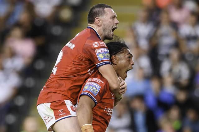Tom Amone celebrates his try against Hull FC with James Batchelor. (Photo: Allan McKenzie/SWpix.com)