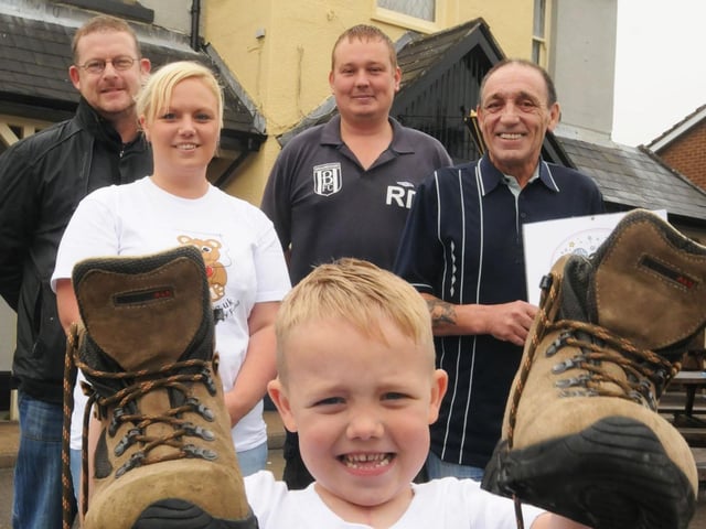 Four-year-old Kian Butler was ready to do a charity walk back in 2011 pictured are Karl Butler landlord, Deborah Butler, Robert Deakin Broardmeadows and Eric Butler Grandad