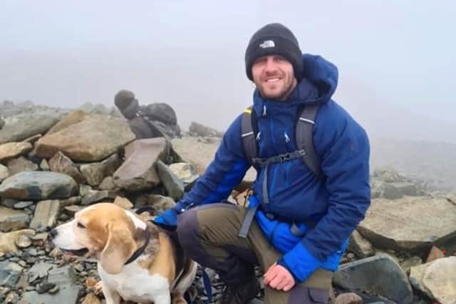 photo issued by Police Scotland of Kyle Sambrook, 33, with his beagle called Bane. The 33-year-old was last seen with dog in the Lost Valley area of Glencoe last weekend. The body of a man and a dog have been found in the search for the missing hillwalker. Police Scotland have now said the bodies of a man and dog were recovered by mountain rescue teams and the Coastguard on Saturday afternoon. Issue date: Sunday February 26, 2023.