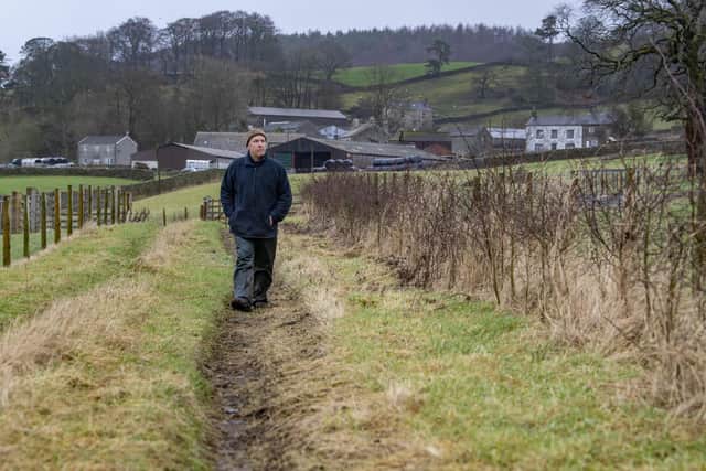 Anthony Bradley at Mearbeck, Long Preston in the Yorkshire Dales. He has cattle and sheep on his 90 acre farm - heâ€™s also into regenerative farming and as such has put in hedges and fenced off becks and River Ribble. Picture Tony Johnson. 3 February 2023