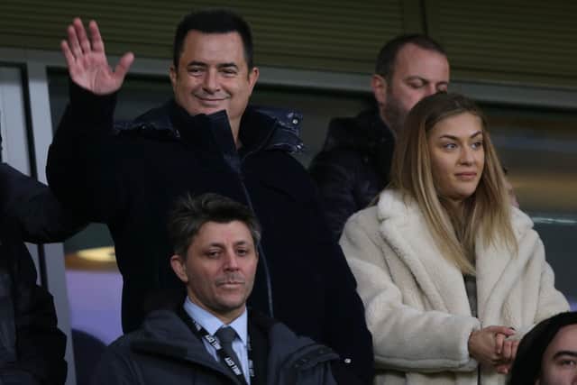 VISION: Hull City owner/chairman Acun Ilicali pictured waving with partner Ayca Cagla Altunkaya (right) and right-hand man Tan Kesler (front, left) . PIcture: Ian Hodgson/PA.