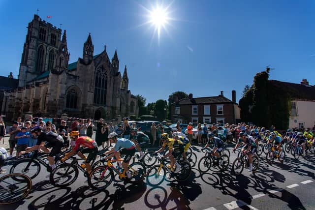 Tour of Britain stage 3: Gooole to Beverley The peloton passes Howden Minster on its way to the East Coast. (Picture: Bruce Rollinson)