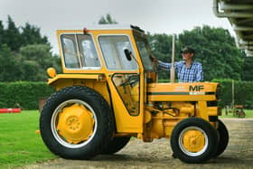 Oliver Godfrey with a restored Cheshire Highways Massey Ferguson 20 Multi Power.
Photographed for the Yorkshire Post by Jonathan Gawthorpe.