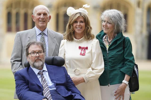 Kate Garraway, with her husband Derek Draper and her parents Gordon and Marilyn Garraway, after being made a Member of the Order of the British Empire for her services to broadcasting, journalism and charity by the Prince of Wales during an investiture ceremony at Windsor Castle, Berkshire in June 2023.