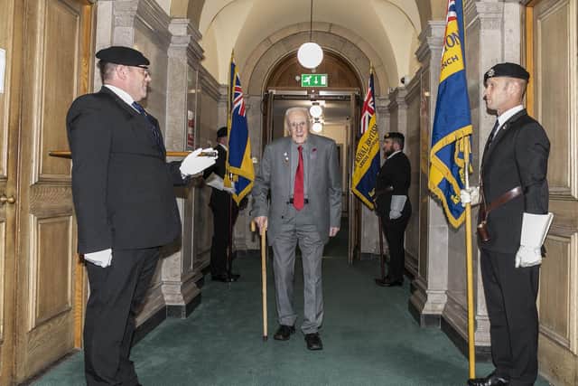 D-Day veteran Jack Mortimer, who bravely stormed Nazi-occupied beaches while under fire during WW2, has received a guard of honour on his 100th birthday, pictured at Leeds Civic Hall, Oct 11 2023.