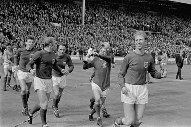 SWEET MEMORIES: Jubilant England players parade the World Cup around Wembley after their 4-2 win: (l-r) Gordon Banks, Alan Ball, Martin Peters, Bobby Moore, George Cohen, Ray Wilson, Bobby Charlton, Jack Charlton. Picture: PA Photos/PA Wire
