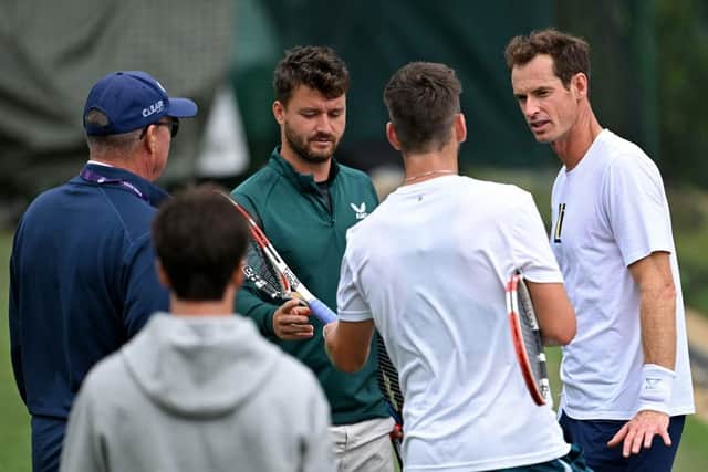 Home hopes: Andy Murray of Great Britain speaks with Cameron Norrie of Great Britain during a practice session ahead of The Championships (Picture: Shaun Botterill/Getty Images)