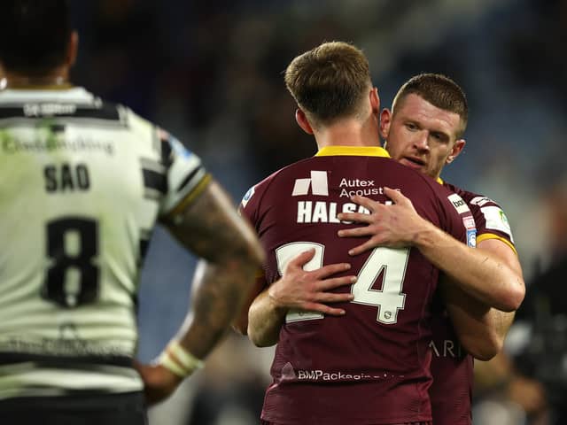 Olly Russell and Sam Halsall embrace after the win over Hull. (Photo: John Clifton/SWpix.com)