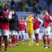 TOUGH NIGHT: Rotherham United's players show their disappointment after Tuesday's 5-0 defeat at Coventry City Picture: Bradley Collyer/PA