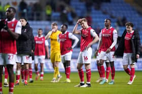 TOUGH NIGHT: Rotherham United's players show their disappointment after Tuesday's 5-0 defeat at Coventry City Picture: Bradley Collyer/PA