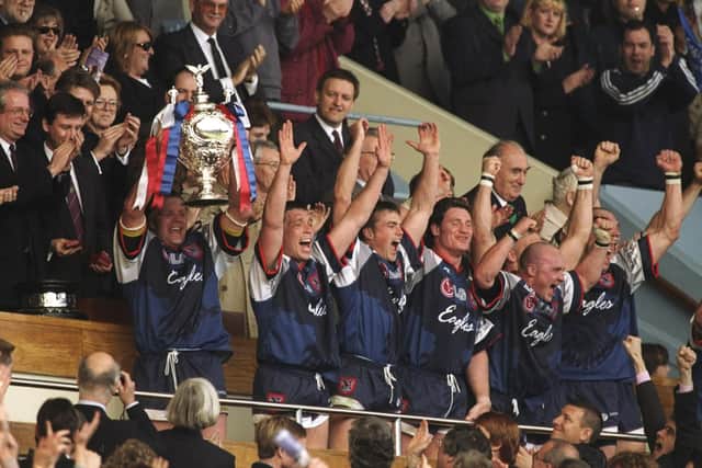 Mark Aston, second left, celebrates on the old Wembley balcony. (Photo: Getty Images)