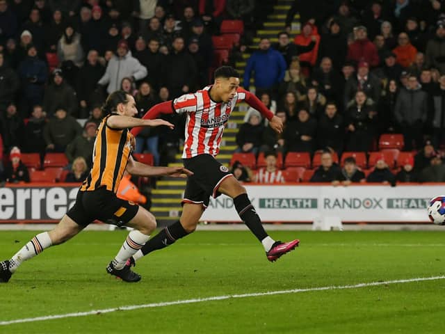 Sheffield United's Daniel Jebbison scores in the fourth minute during their Sky Bet Championship match against Hull City at Bramall Lane. Picture: Andrew Yates / Sportimage