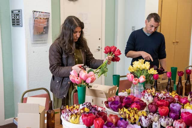 Competitors  prepare their  blooms for judging at the Wakefield & North of England Tulip Society Show held at Ossett War Memorial Community Centre