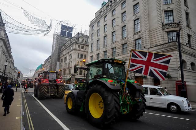 A tractor is driven through Oxford Circus in central London, during a protest by farmers last year. PA Photo. PIC: Ben Whitley/PA Wire