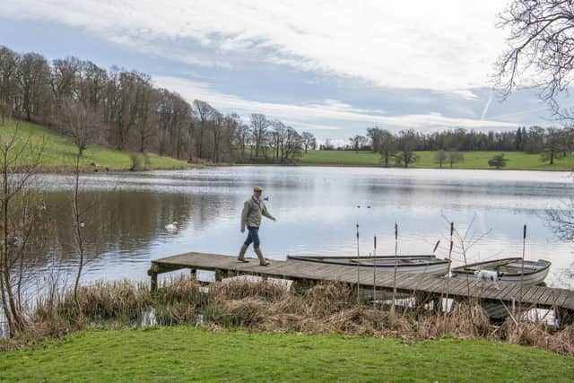 Roddy Bannister who has taken over the family owned Coniston Hotel Country Estate & Spa at Coniston Cold in the Yorkshire Dales, pictured on the estate with his dog Ernest. Photograph by Tony Johnson.
