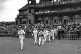 First among equals: Len Hutton leads out England during his first series as captain against India at Old Trafford in 1952. Photo by Central Press/Getty Images.