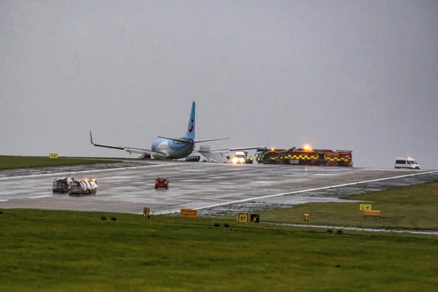 A Tui plane which has slipped off the runway at Leeds Bradford Airport whilst Storm Babet hit