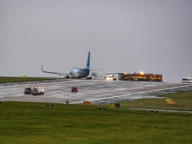 A Tui plane which has slipped off the runway at Leeds Bradford Airport whilst Storm Babet hit
