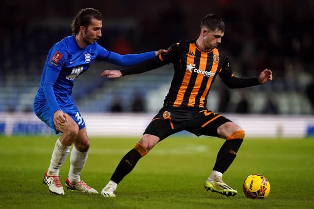 Hull City's James Furlong (right) shields the ball from Birmingham City's Ivan Sunjic (Picture: Mike Egerton/PA Wire)