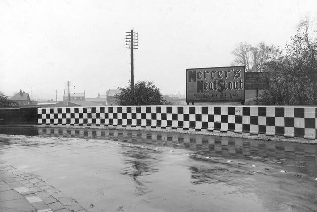 Leeds and Bradford Road in November 1941 showing Ellers Bridge which spans the Leeds and Liverpool Canal. Part of the wall is painted in a chequered pattern as a hazard warning; this place has become a notorious accident blackspot.