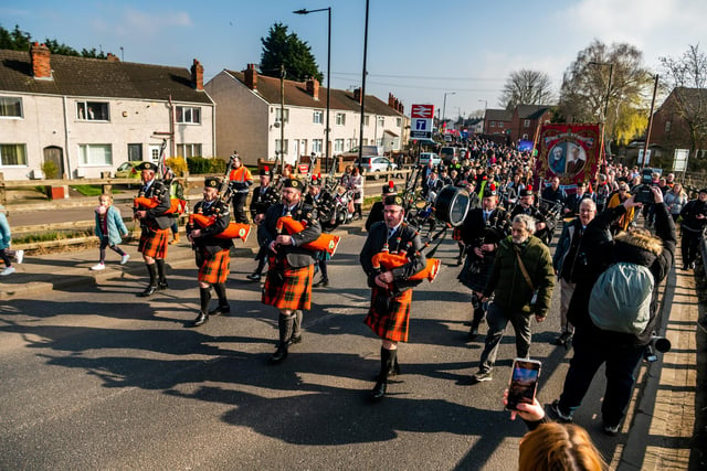 The parade was led by the Doncaster & District, & East Yorkshire Pipe Band plus the Armthorpe Elmfield Brass Band. Picture By Yorkshire Post Photographer,  James Hardisty. Date: 9th March 2024.